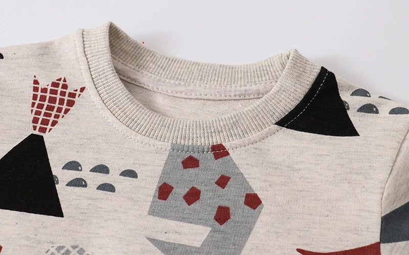 Faszinierende Dino-Drucke – Kuscheliger Kinderpullover für kalte Tage